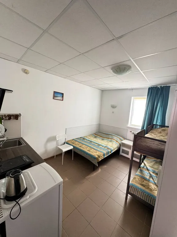 Комната с кухонным уголком и верандой