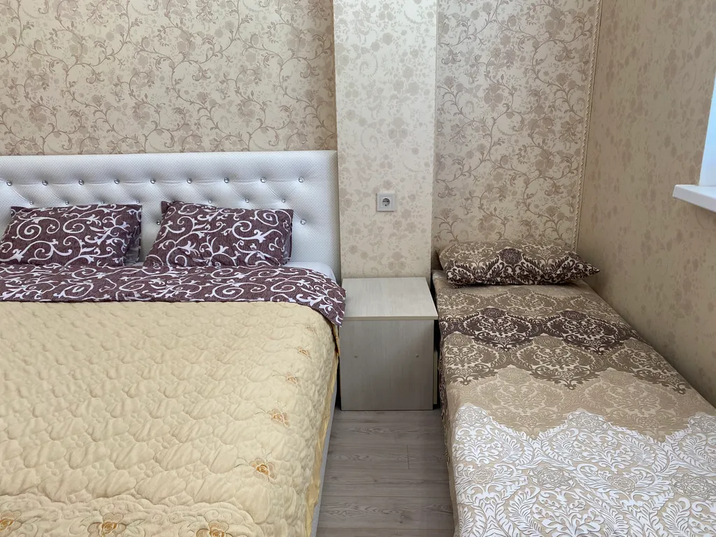 Апартаменты с большой кроватью и кухней