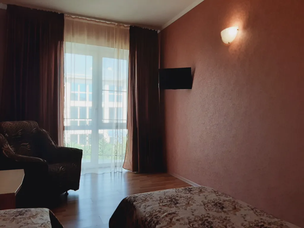 Уютные номер в доме для проживания гостей