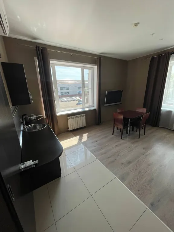 Семейный номер в отеле с мини-кухней