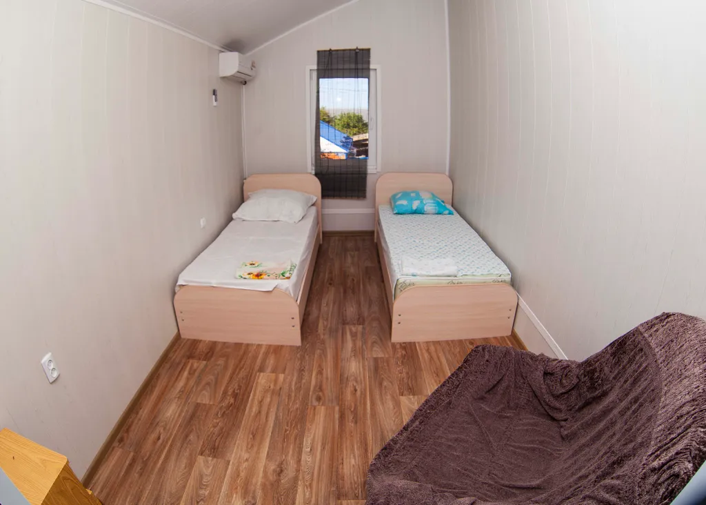 Коттедж Коттедж Уютные апартаменты с 2-мя спальнями — Ейск