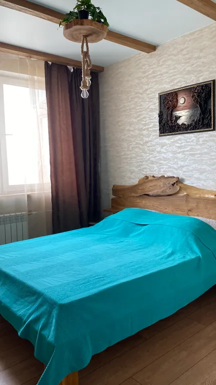 Апартамент с лаундж-зоной в экодизайне в центре города