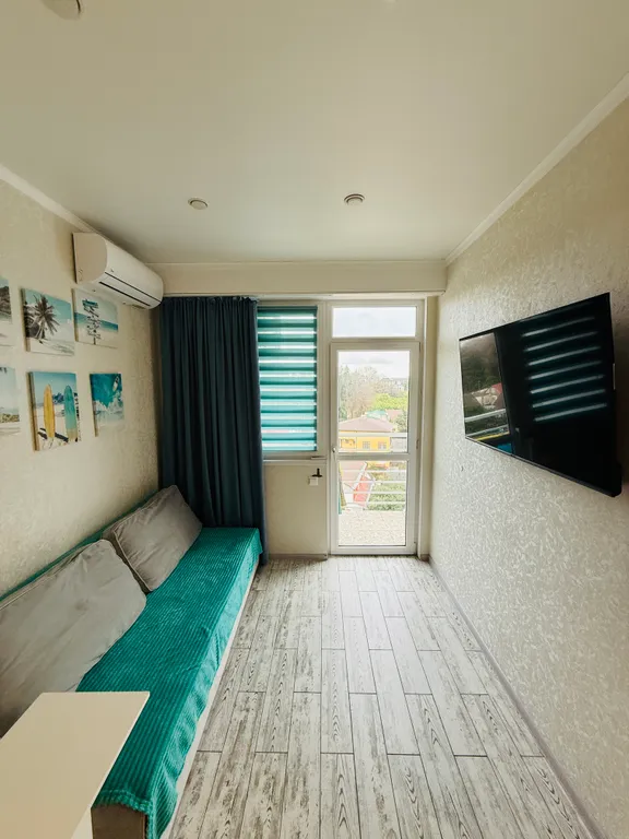 Квартира Квартира Уютная евродвушка с балконом рядом с морем в центре Адлера — Сириус