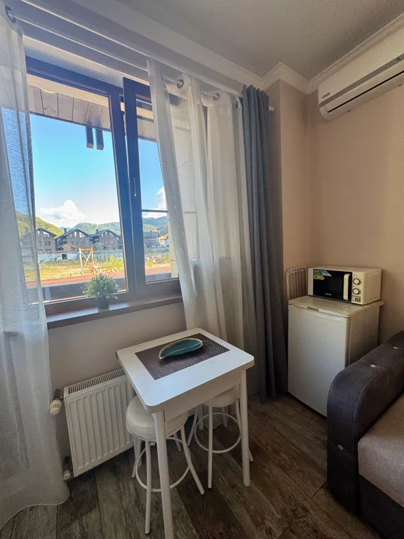 Студия с балконом в центре