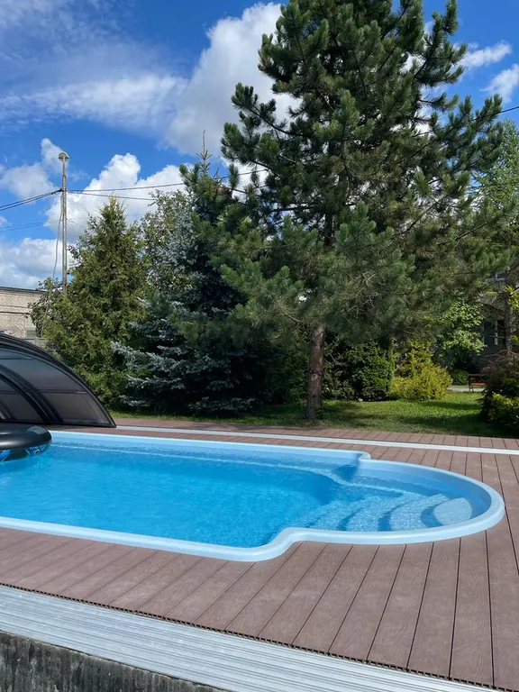 Дом для отдыха с баней и бассейном WoodRay