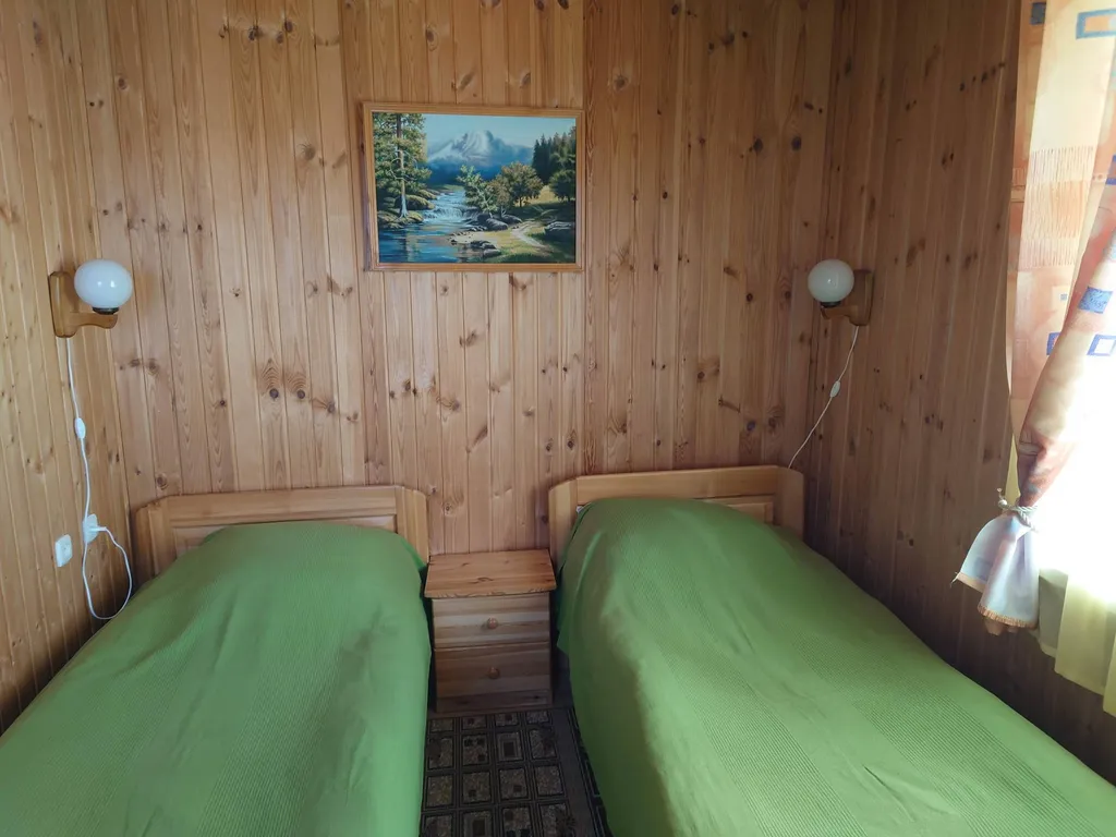 Квартира Комната на 2 человека, с двумя кроватями и видом на озеро — аренда посуточно в Медвежьегорск