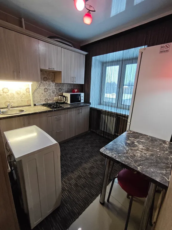 Квартира в центре с кованной кроватью