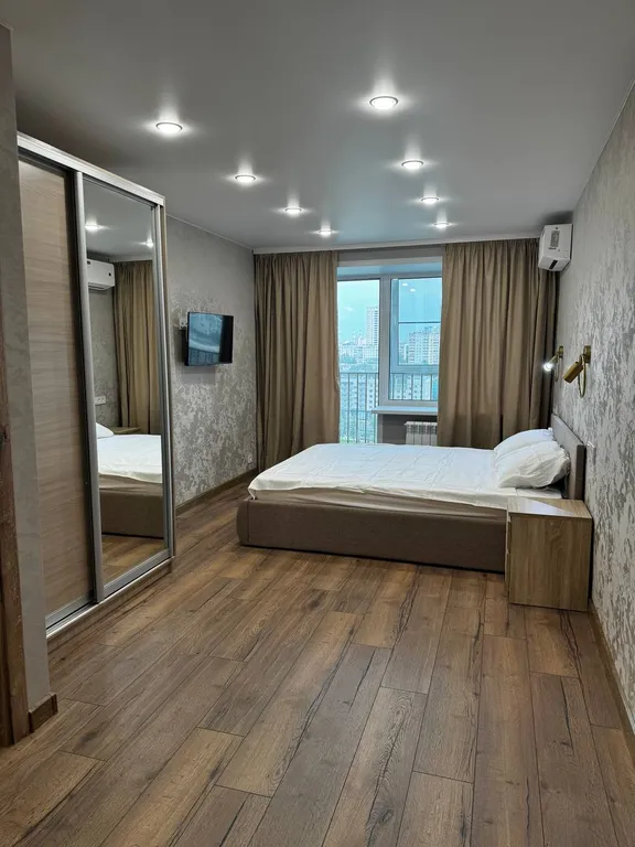 Современная квартира с шикарным видом на центр города и фонтаны