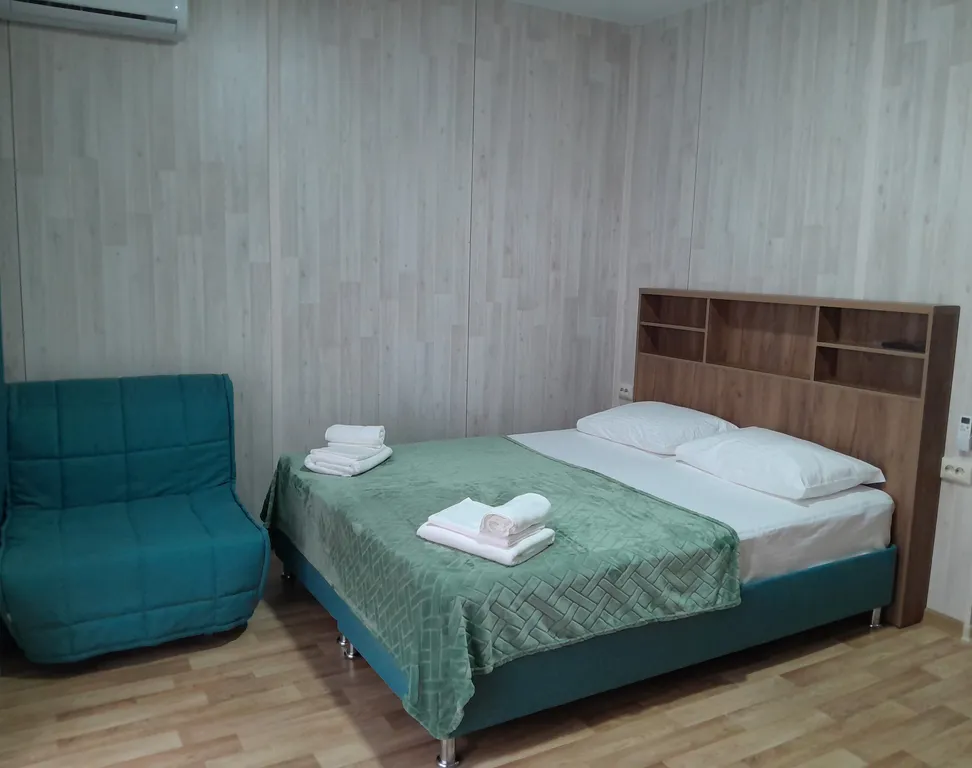 Четырехместный двухкомнатный номер с балконом