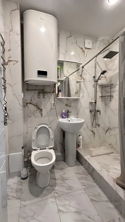 Апартаменты класса люкс с видом на море и горы в центре города