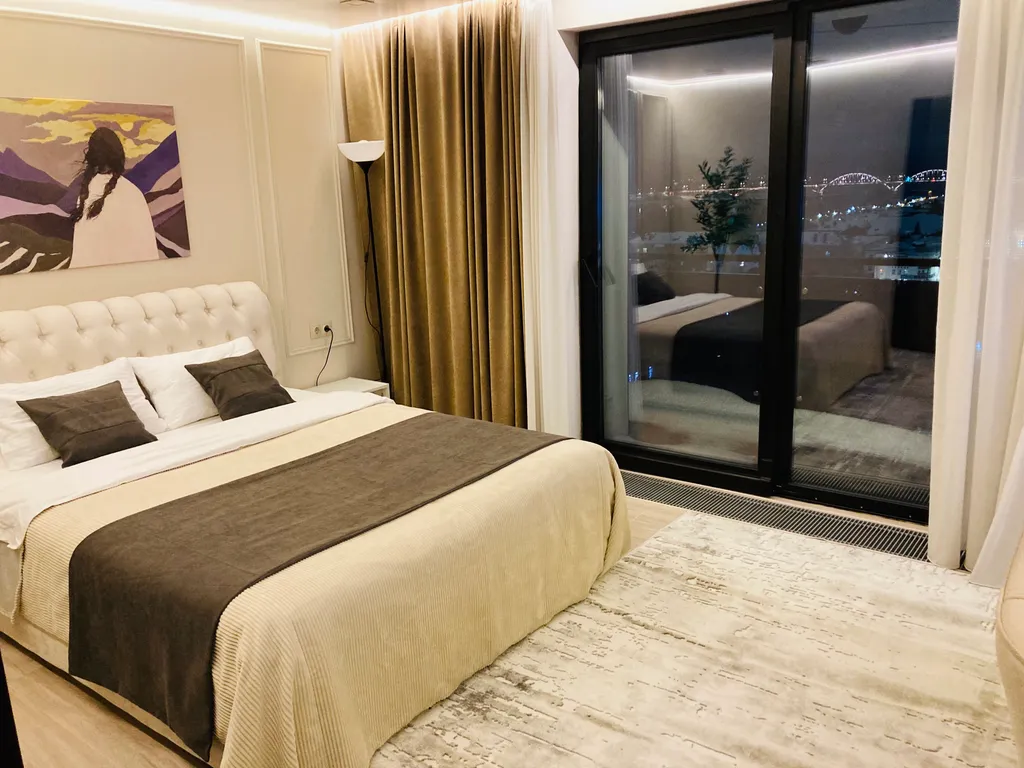 Апартаменты на уровне облаков с панорамным видом на город