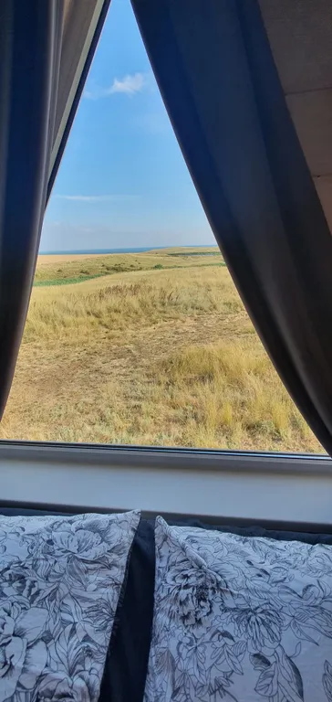 Тpеугольный дом A-frаmе с видом на море