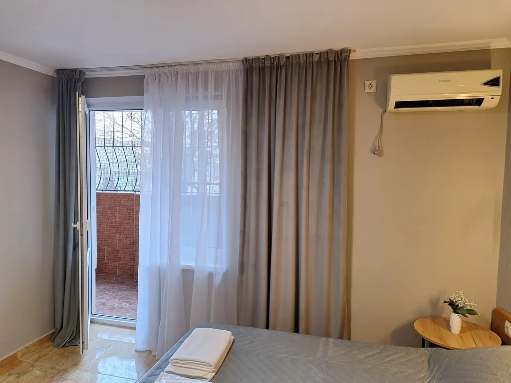 Квартира Квартира Комфорт плюс с террасой четырёхместный номер двуспальной кроватью — Геленджик