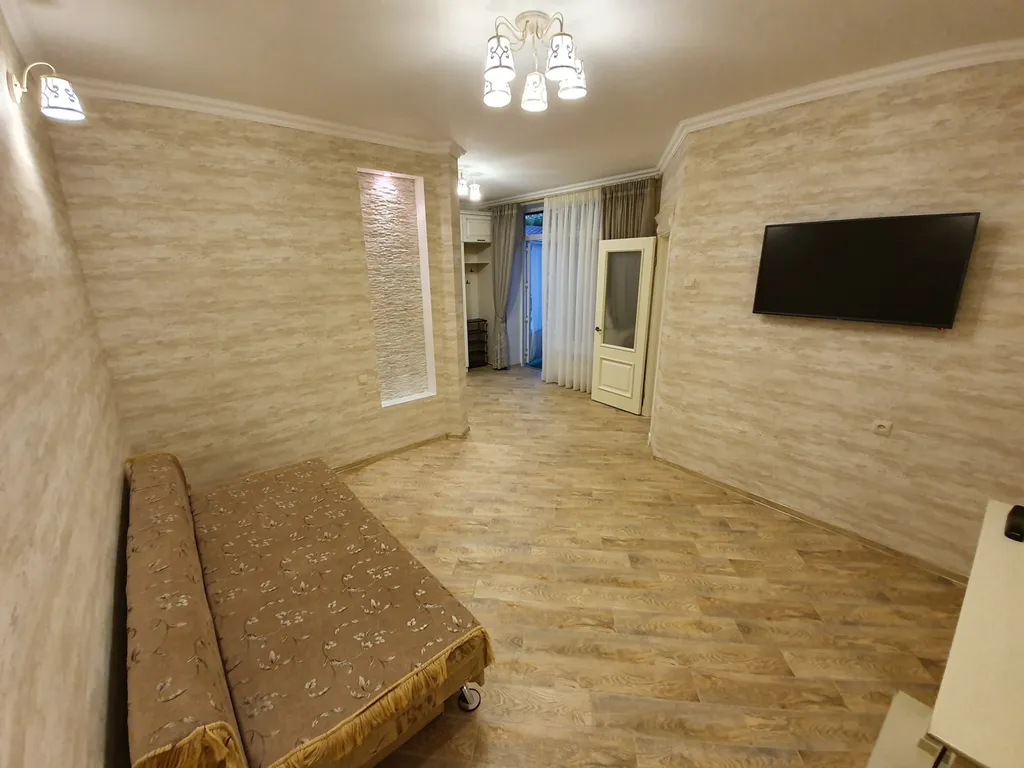 Стильный трехкомнатный дом с отдельной террасой