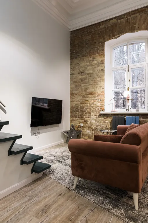 Трехуровневая квартира в историческом доме в центре города