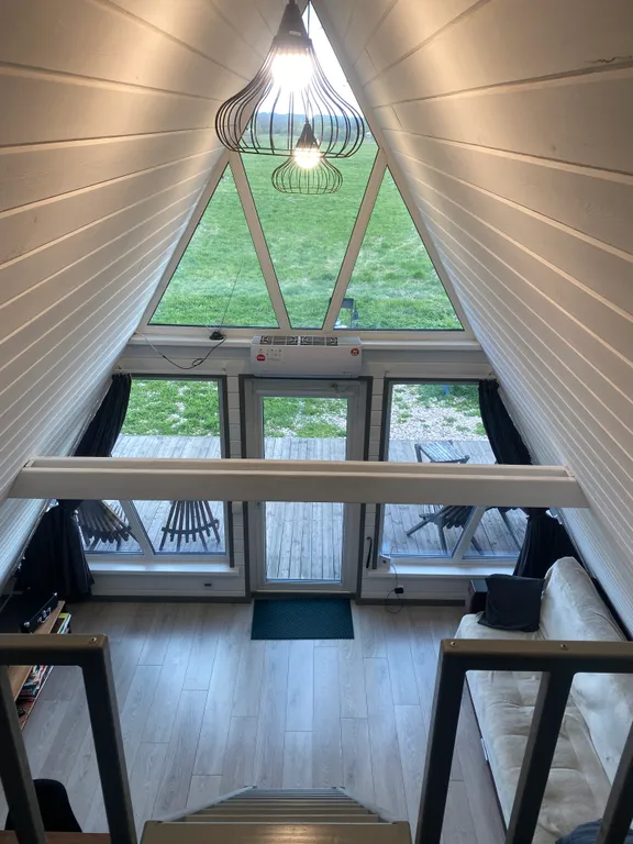 Треугольный дом