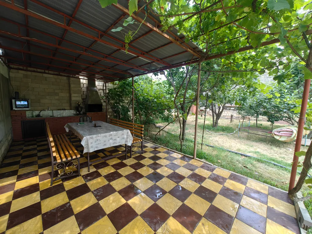 Просторный дом с зоной барбекю