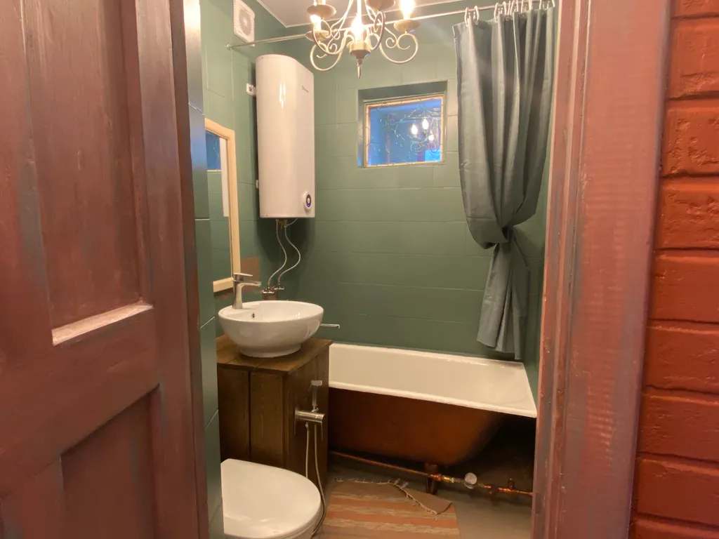 Уютная студия с дизайнерским ремонтом с видом на море и остров Петров