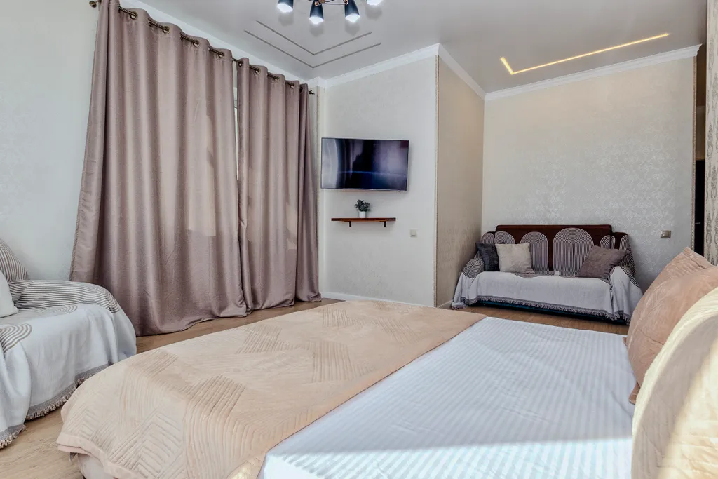 Уютная однокомнатная с видом на город возле набережной в Астане