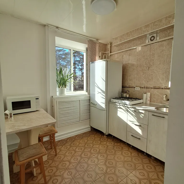 Светлая квартира в центре города с видом на новый сквер