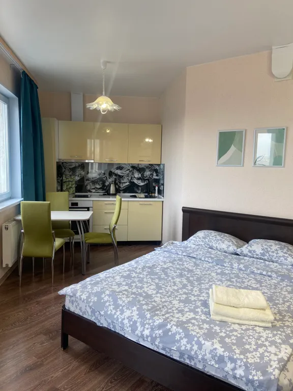 Уютная студия с панорамным видом на город