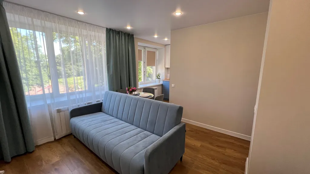 Апартамент у часовой башни и дома гильдии