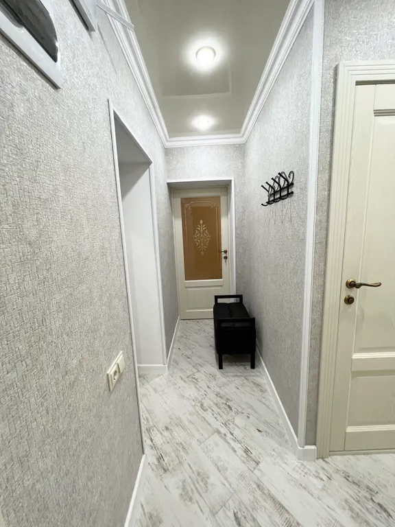 Апартамент с видом на море и на колесо обозрения