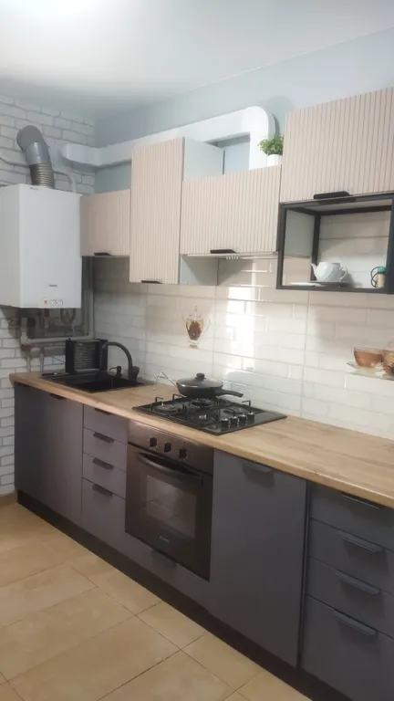 Дом с уютным двориком в тихом районе