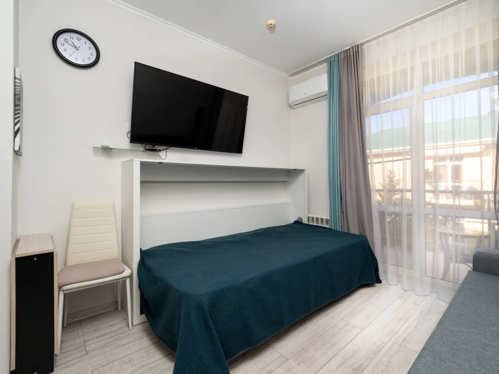 Квартира Квартира Светлая студия у моря с теплым бассейном — Сириус