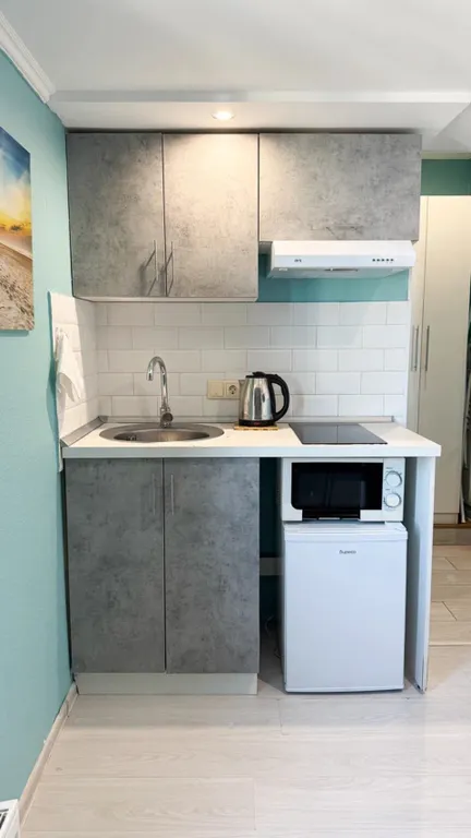 Стильная двухуровневая студия