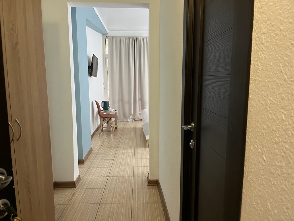 Квартира Квартира Уютный номер на 1 этаже с видом на парк с балконом. — Гагра