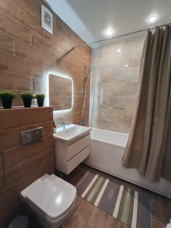 Просторные апартаменты с шикарным видом на город и парк