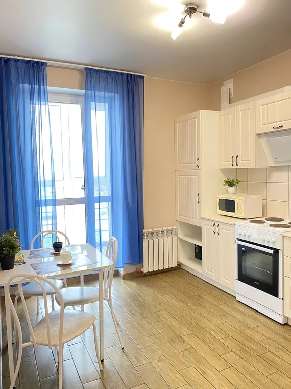 Уютная квартира с ортопедическим матрасом и панорамным балконом