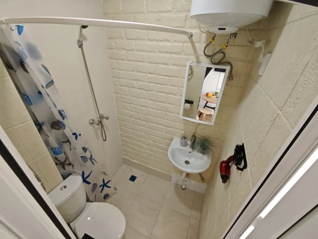 Стильная новая студия с кроватью-трансформером на двоих гостей