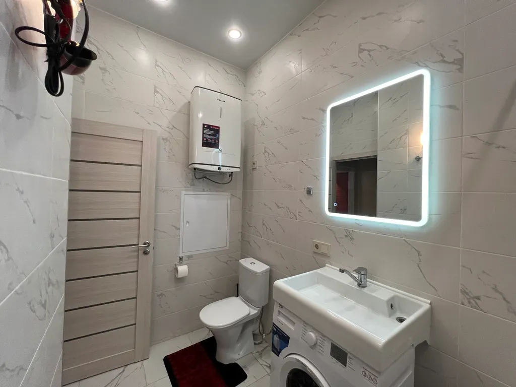 Стильная двухуровневая студия Лофт