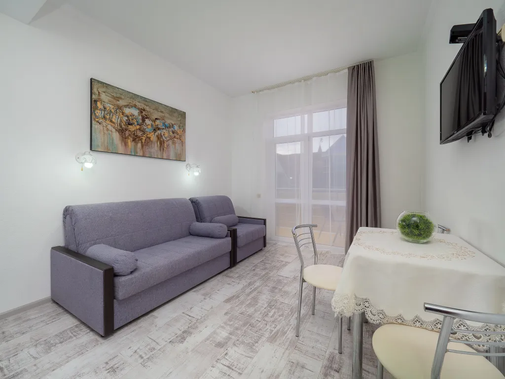 Квартира Квартира Уютная студия у моря с теплым бассейном — Сириус