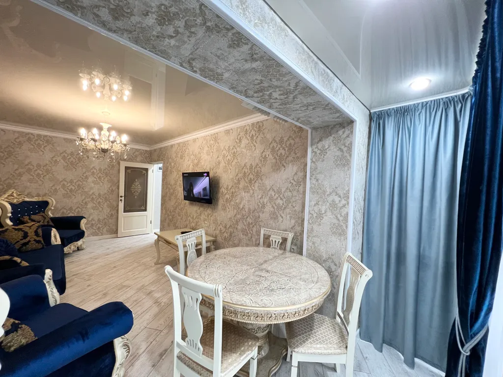 Апартамент с видом на море и на колесо обозрения