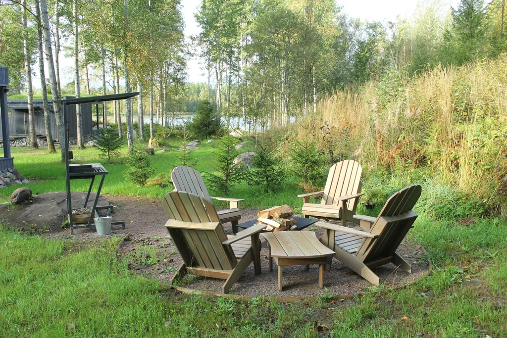 Коттедж Вилла Kolme с видом на лес и зоной барбекю — Приозерск