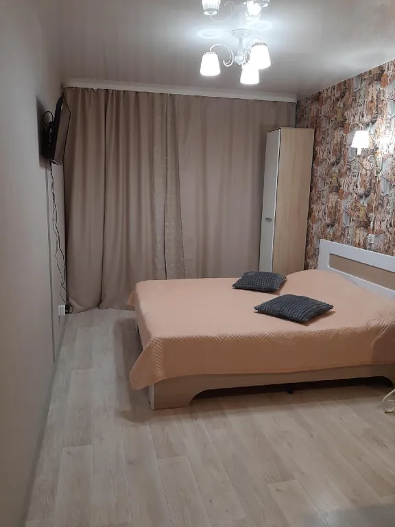 Уютная студия в новом доме с панорамным видом на город