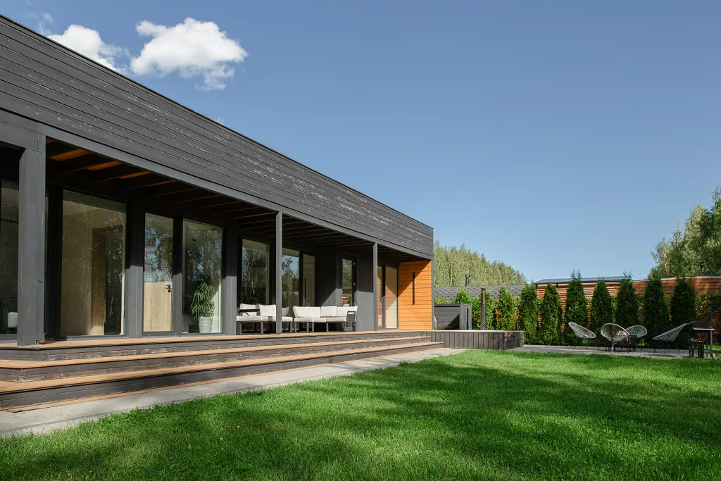 Коттедж Коттедж с панорамными окнами и террасой на крыше — Разметелево