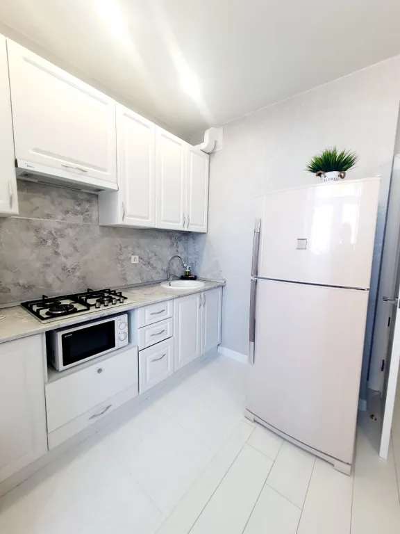 Новая квартира с видом на стадион