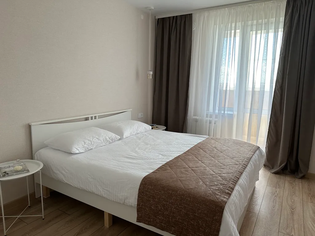 Светлая квартира в 8 минутах езды до центра