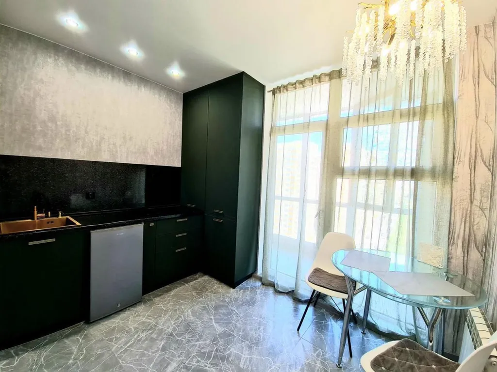 Уютная квартира-студия на Российском проспекте