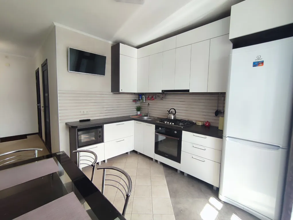 Новые апартаменты в центре, Амфитеатр, парки и старый город рядом.