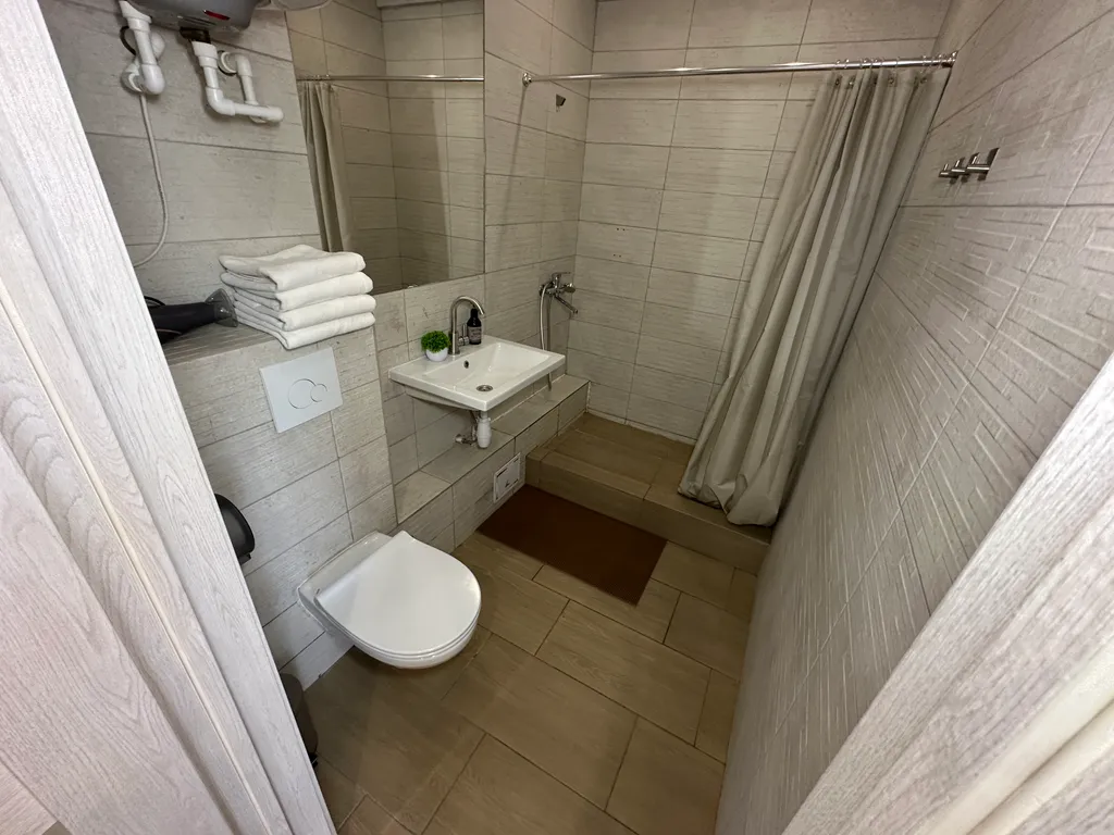 Двухэтажные апартаменты с балконом Столица 2313