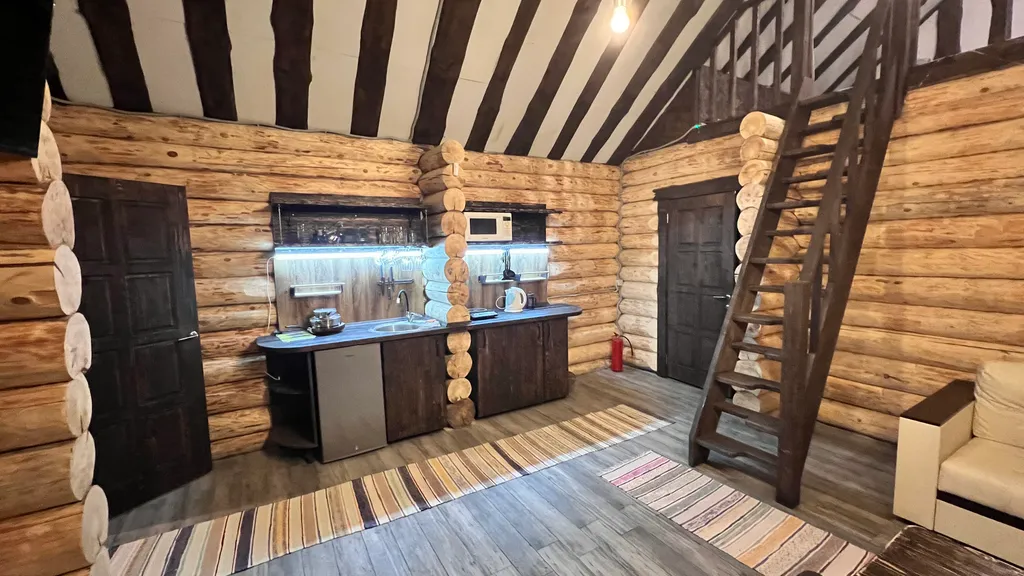 Рубленный дом - баня с террасой