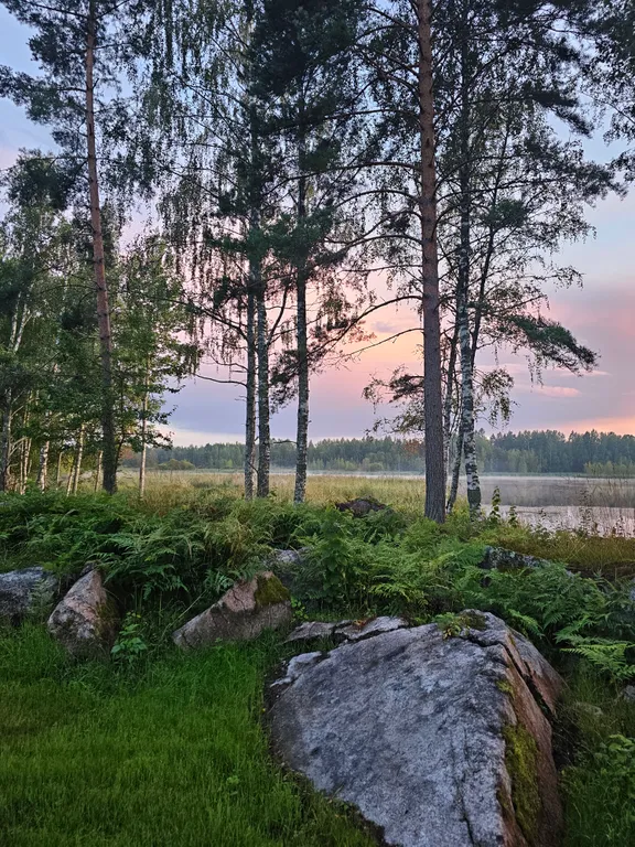 Вилла Nelli с видом на озеро и зоной барбекю среди каменной россыпи