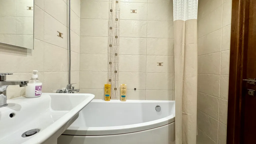 Двухкомнатная квартира в самом центре города с дизайнерским ремонтом