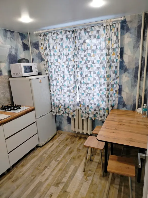 Уютная квартира в самом центре на набережной с видом на парк победы