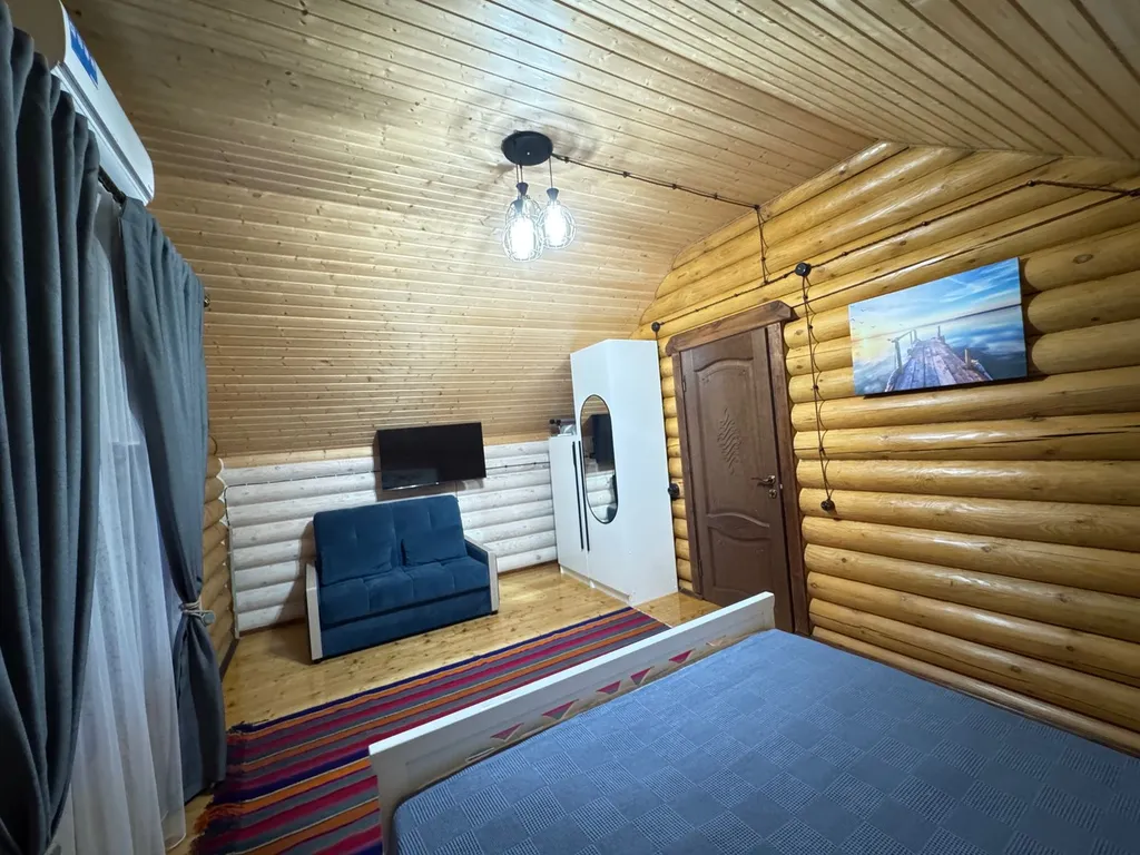 Домик у моря из бруса